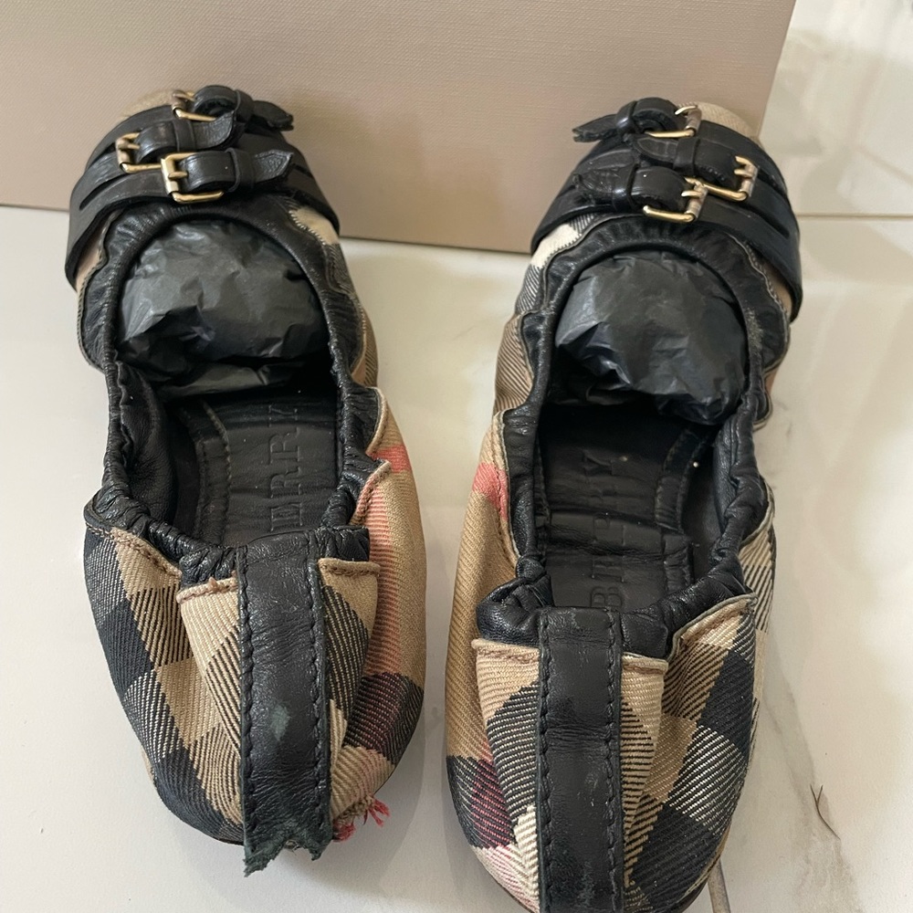 Burberry ballet flats.